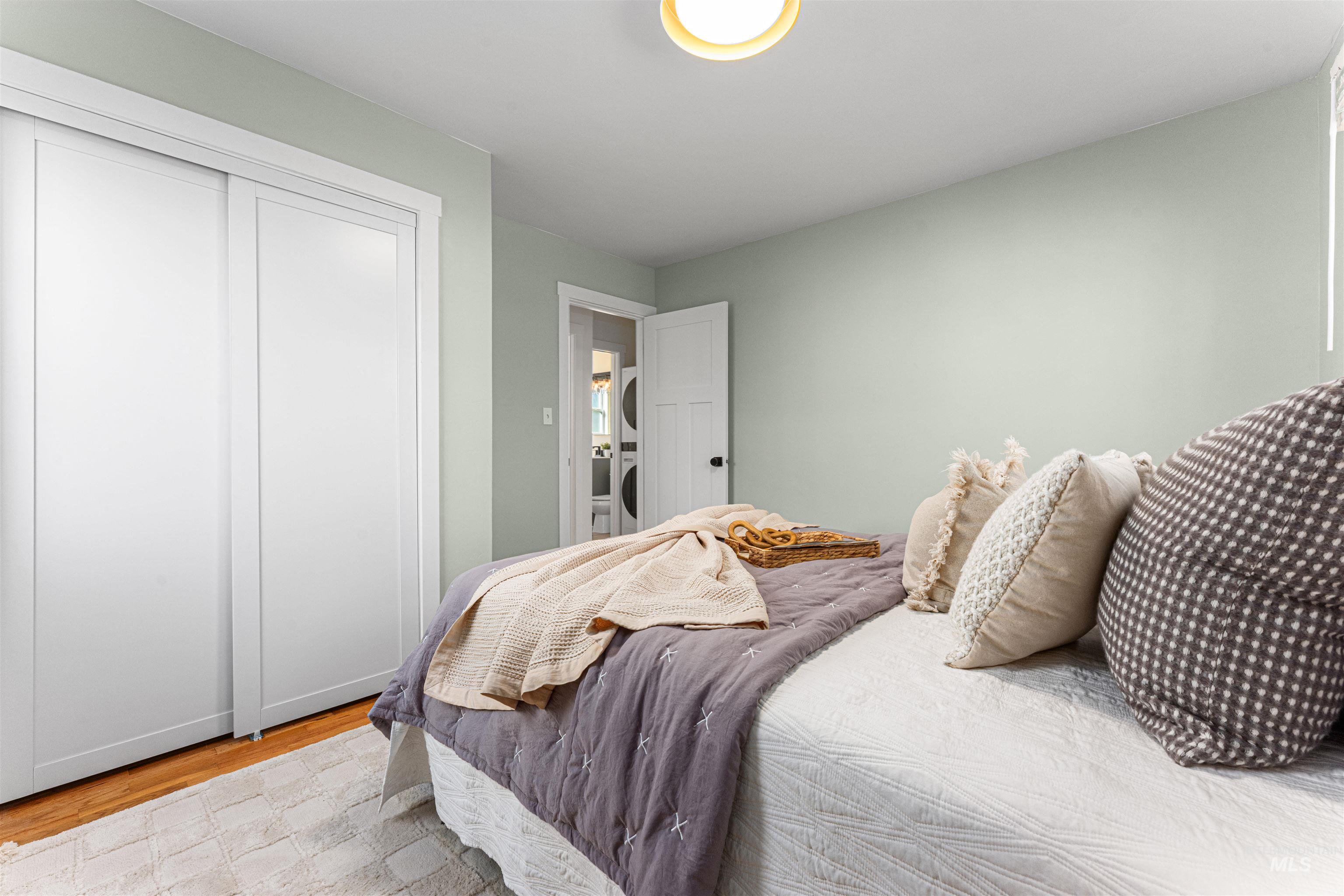 500 North Pacific Street Boise, ID 83706 - Photo 28 of 49 Kitchen with stainless steel appliances, glass insert cabinets, light countertops, and light marble finish flooring