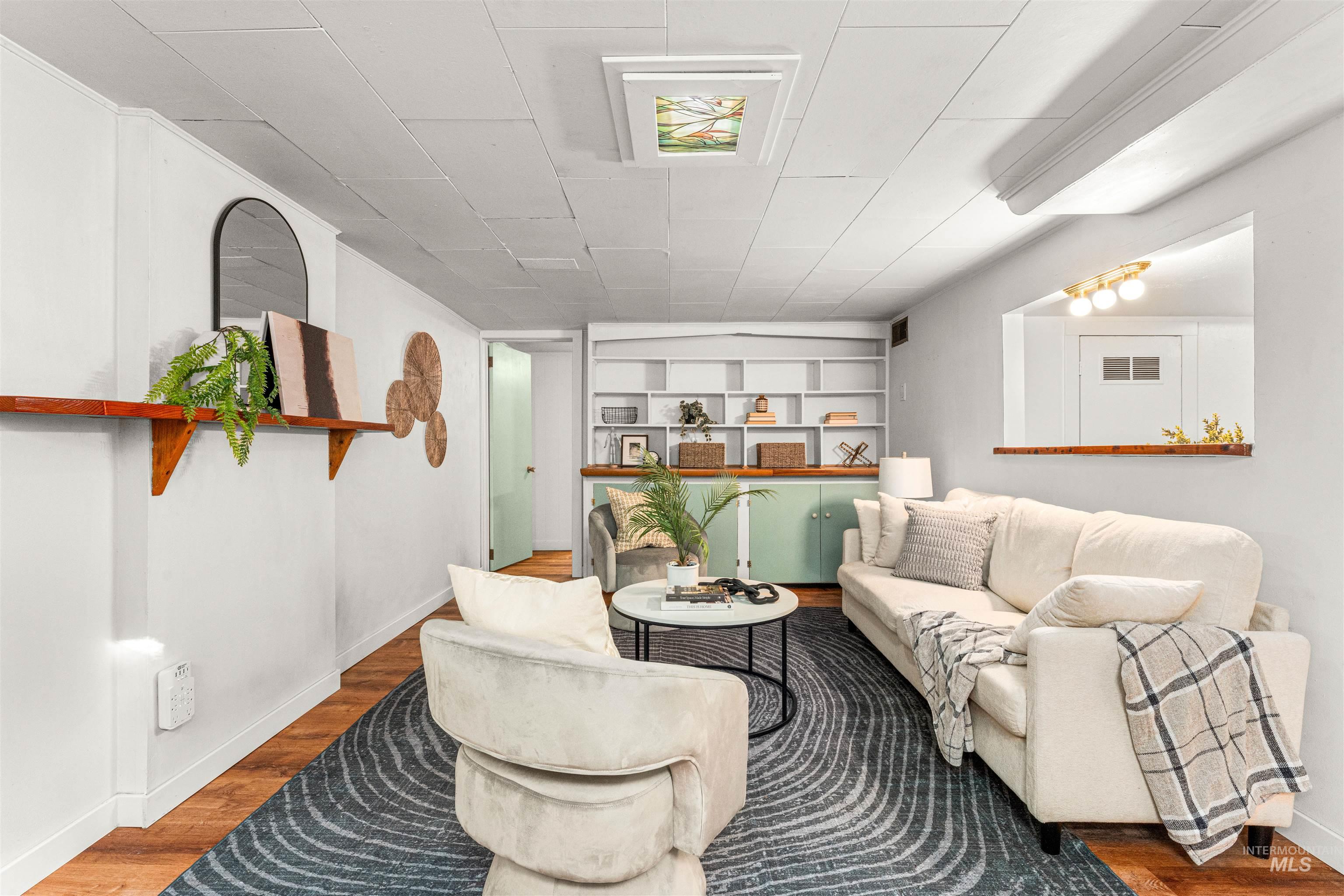 500 North Pacific Street Boise, ID 83706 - Photo 36 of 49 Laundry area with stacked washer / drying machine, wood finished floors, and recessed lighting