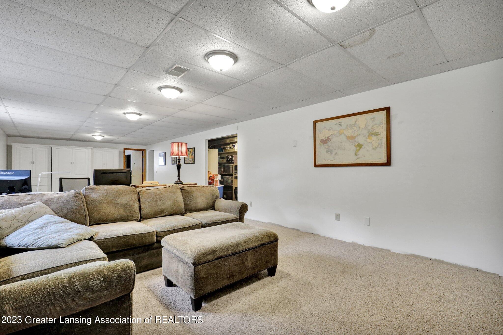 5975 Horstmeyer Road Lansing, MI 48911 - Photo 24 of 43 basement living