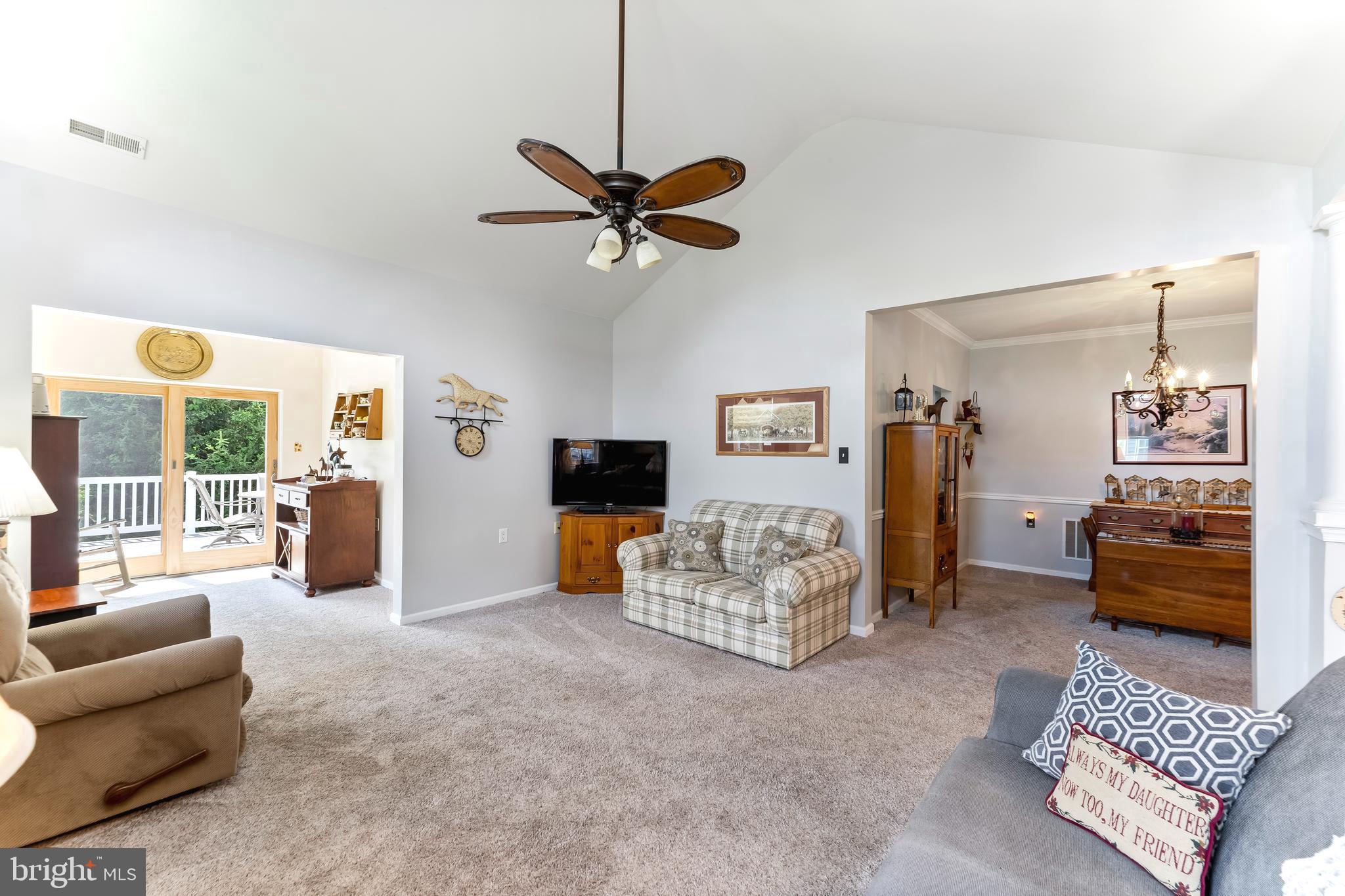 1302 Dawman Road Coatesville, PA 19320 - Photo 5 of 22 Living Room to Sunroom & Dining Room