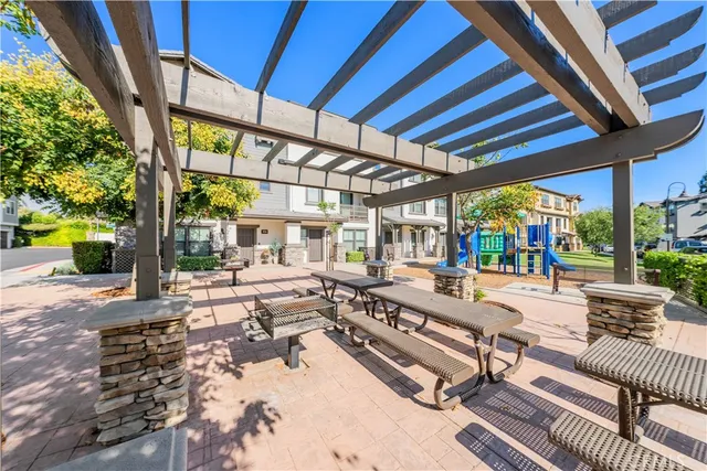 a view of a swimming pool with a patio