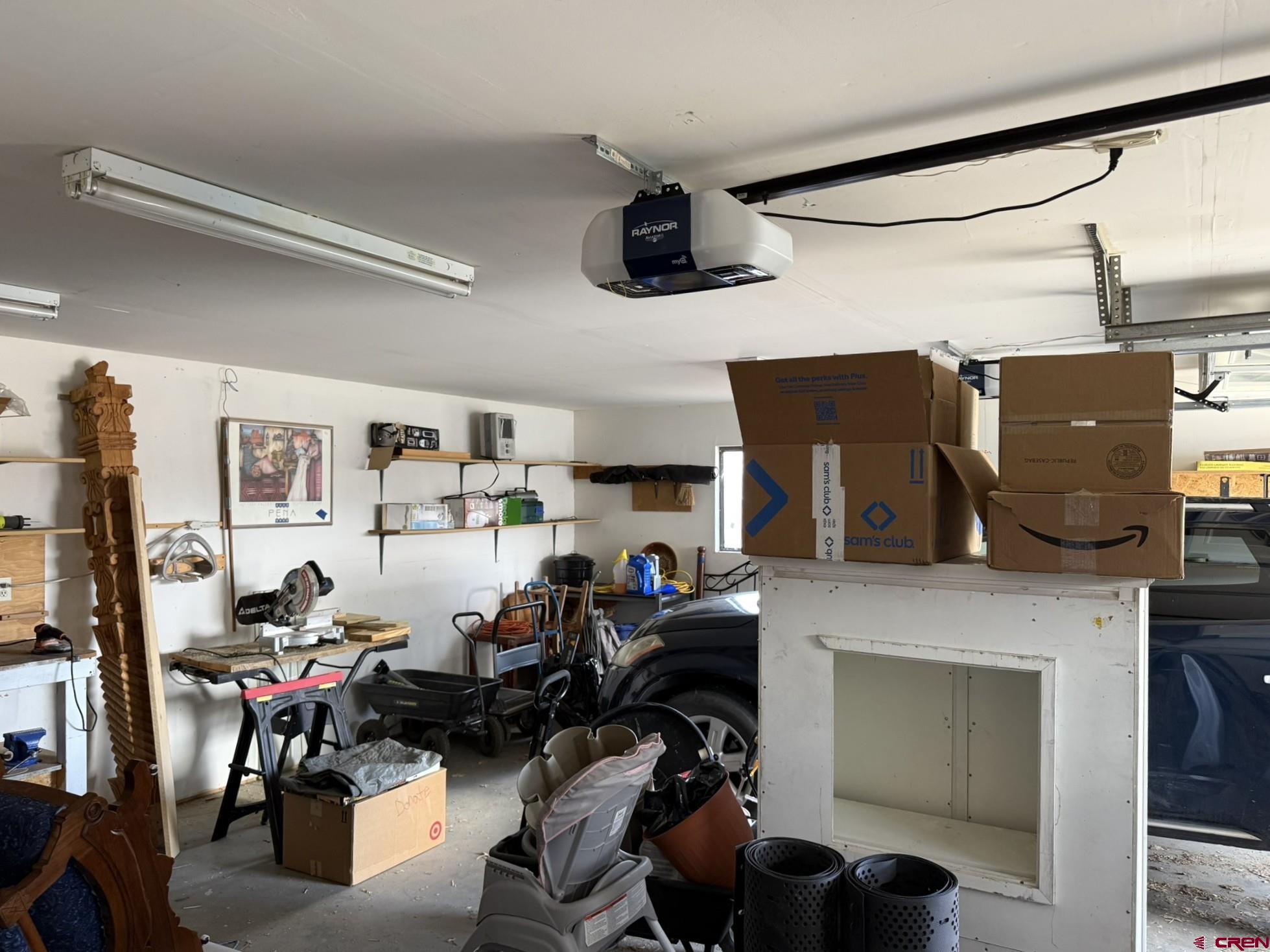 585 Elizabeth Street Delta, CO 81416 - Photo 11 of 36 a room with gym equipment and a flat screen tv