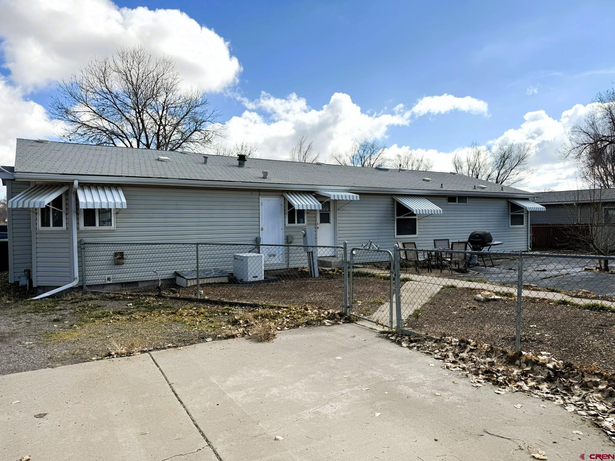 585 Elizabeth Street Delta, CO 81416 - Photo 12 of 36 a view of a house with a patio