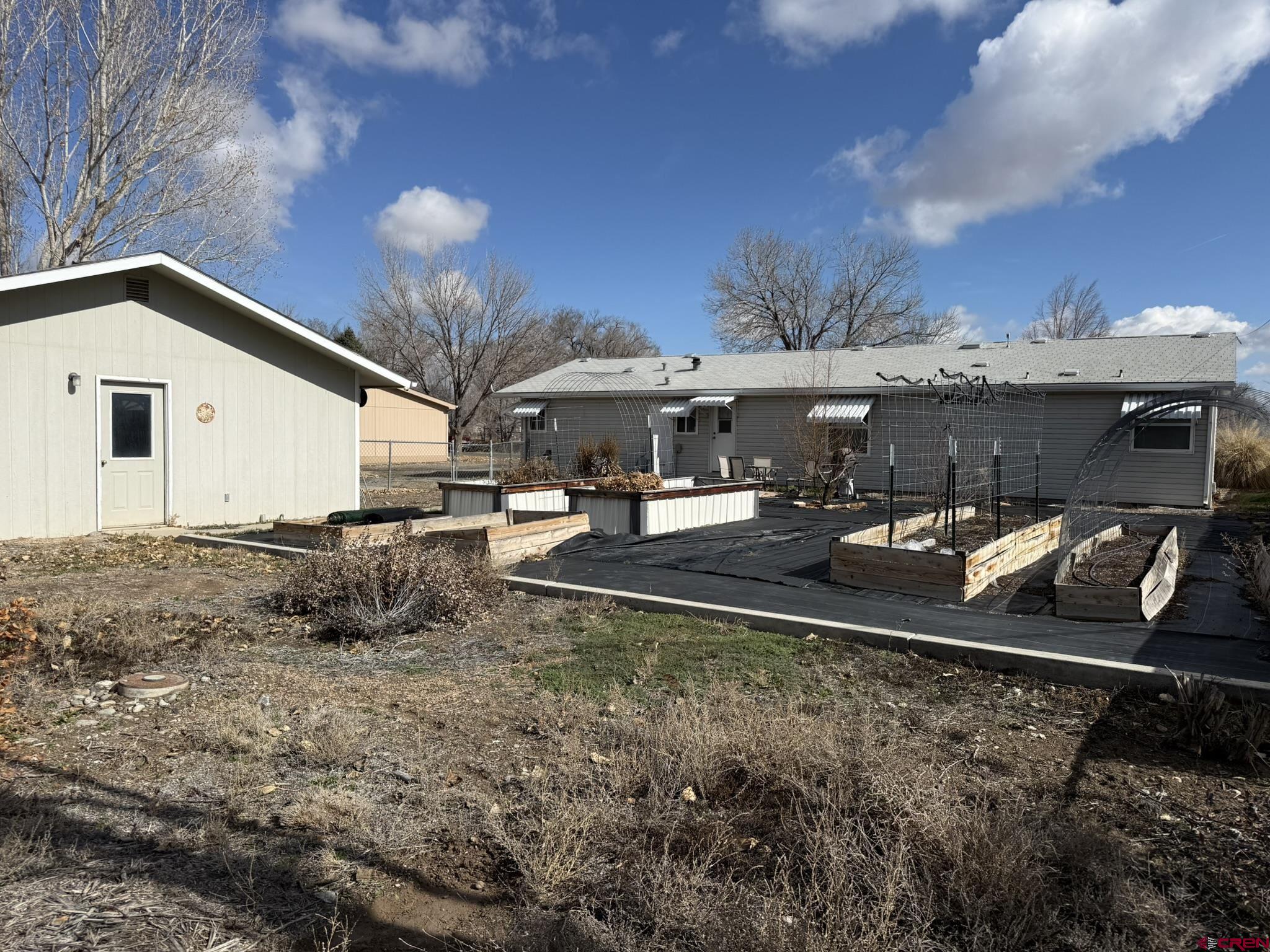 585 Elizabeth Street Delta, CO 81416 - Photo 16 of 36 a view of a house with a yard
