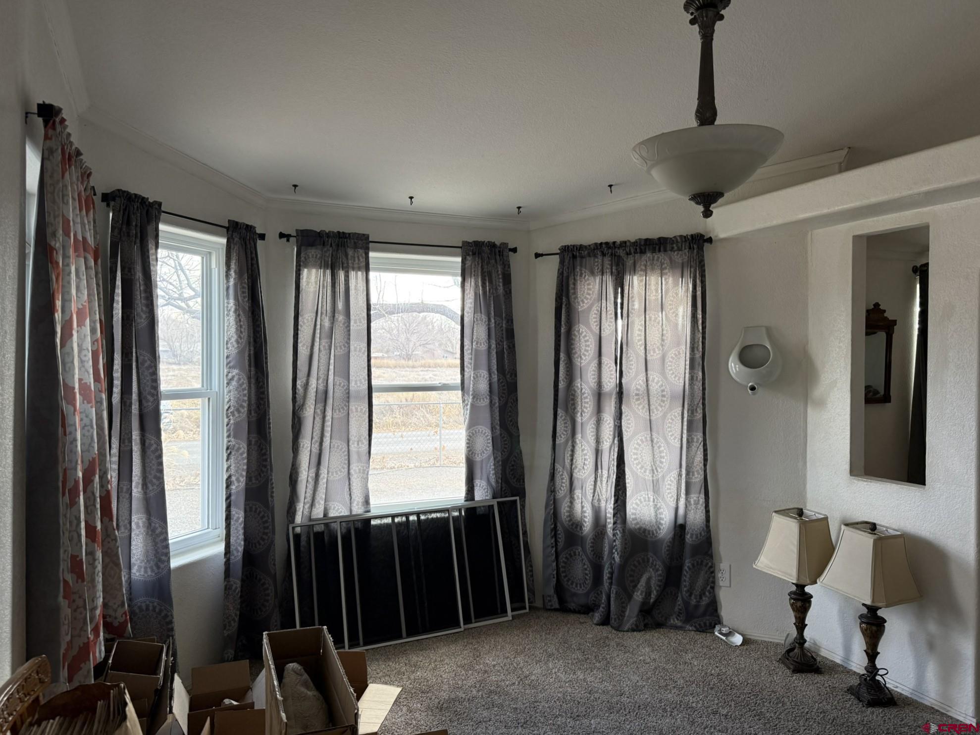 585 Elizabeth Street Delta, CO 81416 - Photo 18 of 36 a view of a livingroom with furniture and windows
