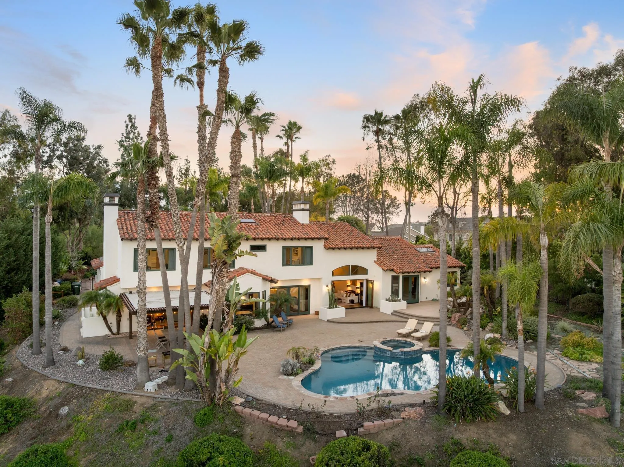 3028 Paseo Cielo Rancho Santa Fe, CA 92024 - Photo 46 of 50 a front view of a house with garden