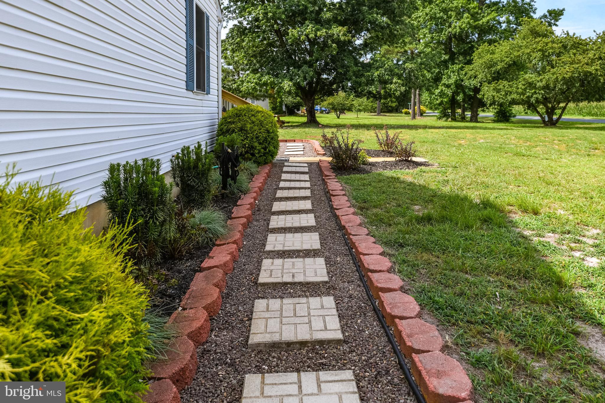 36062 Cobbs Hill Road Willards, MD 21874 - Photo 38 of 43 Paver walkway around the home