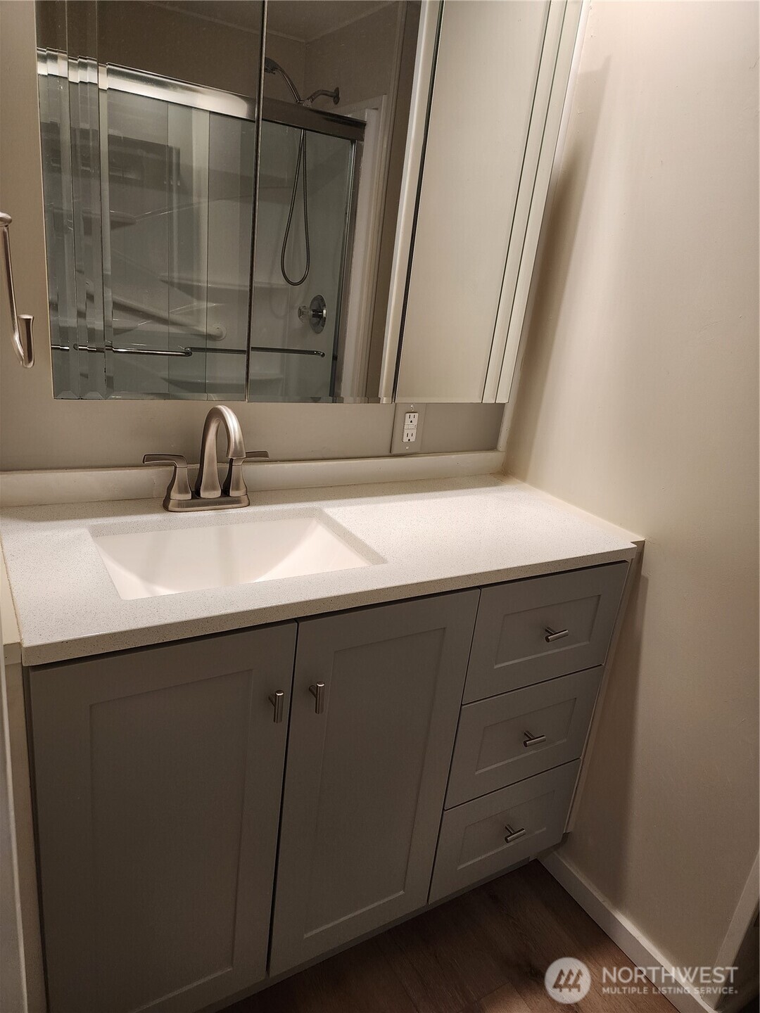 201 Union Avenue Southeast, Unit 43 Renton, WA 98059 - Photo 11 of 34 a bathroom with a sink and a mirror