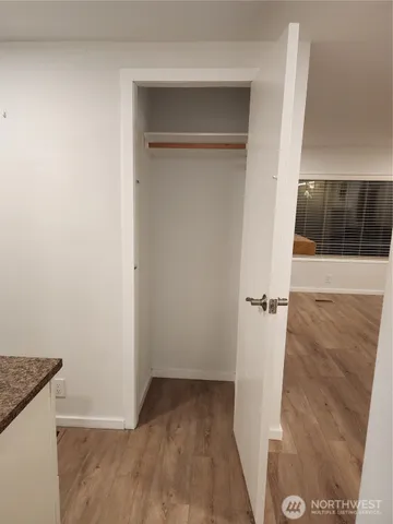 a stove top oven sitting inside of a kitchen