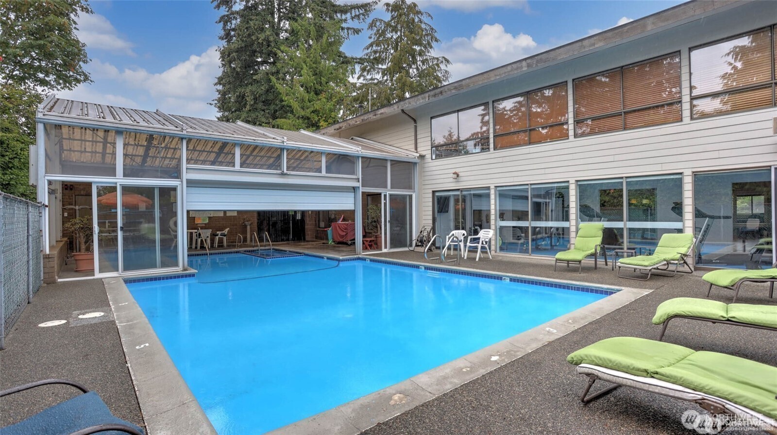 201 Union Avenue Southeast, Unit 43 Renton, WA 98059 - Photo 29 of 34 a view of house with swimming pool and porch