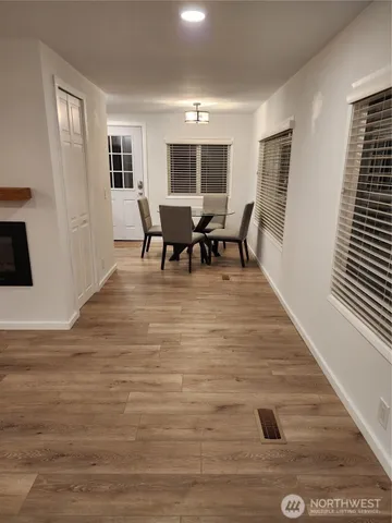 a view of a living room and dining room