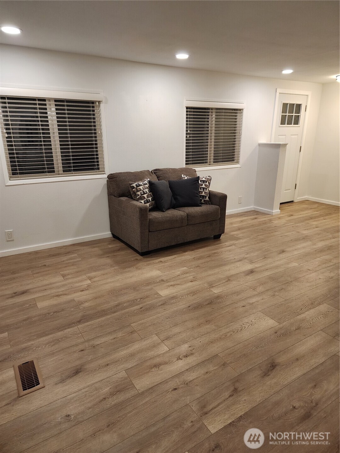 201 Union Avenue Southeast, Unit 43 Renton, WA 98059 - Photo 5 of 34 a living room with furniture and a flat screen tv
