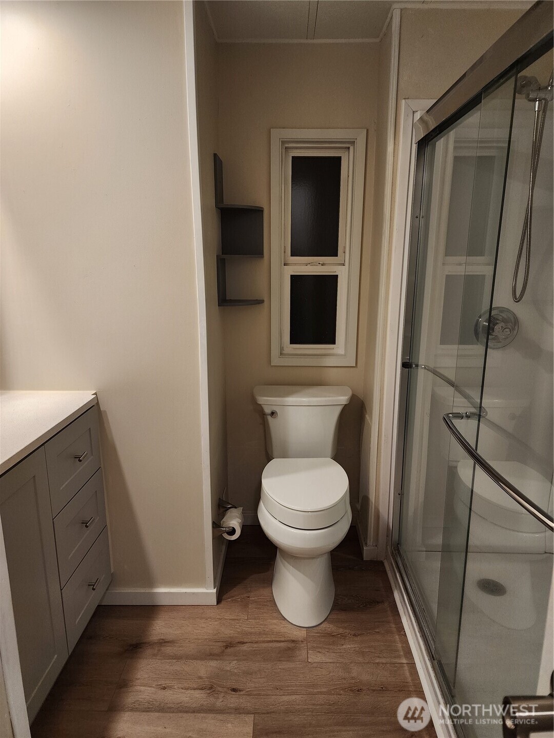 201 Union Avenue Southeast, Unit 43 Renton, WA 98059 - Photo 10 of 34 a bathroom with a toilet and a shower