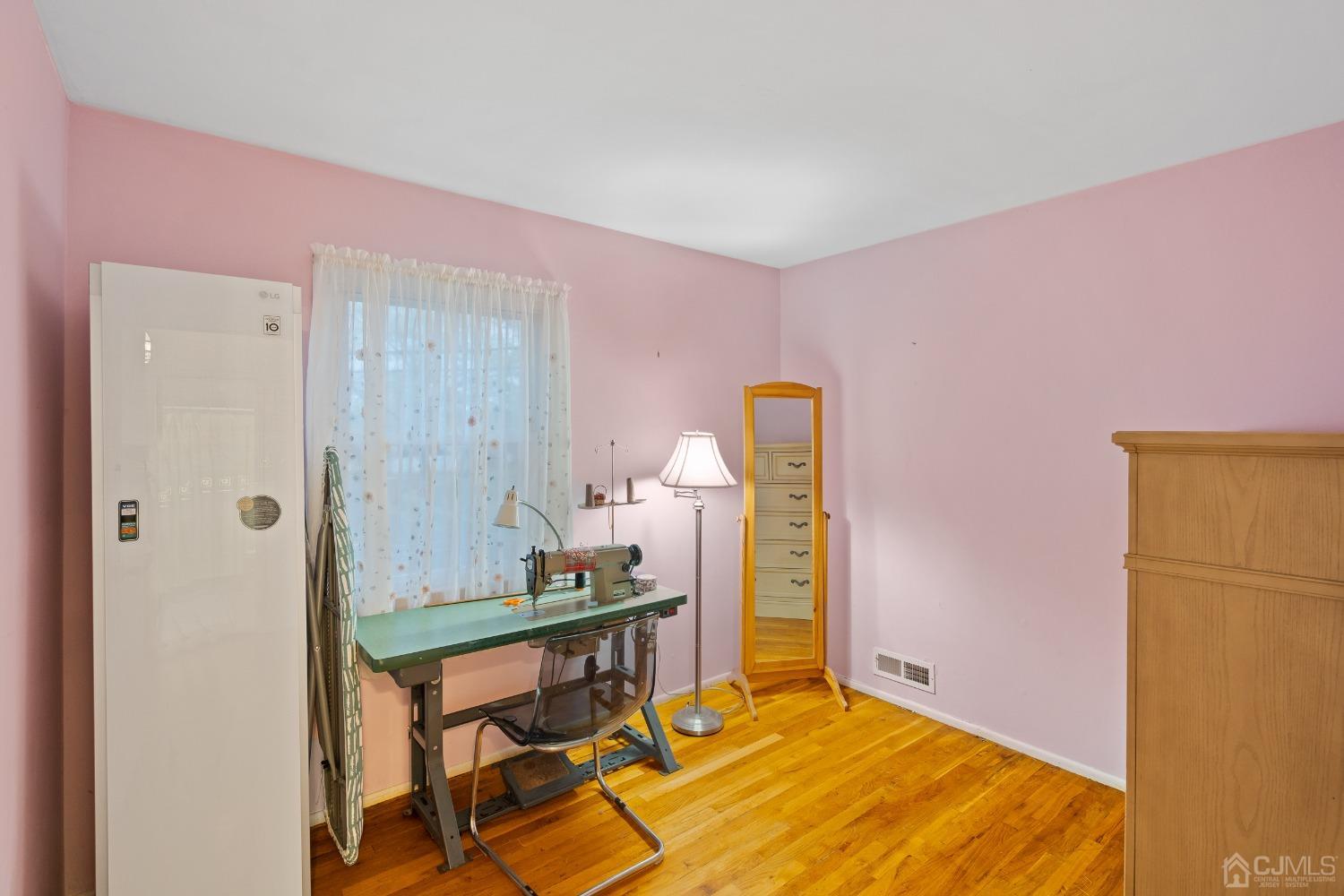 12 Meyer Road Edison, NJ 08817 - Photo 13 of 21 a room with table and chairs