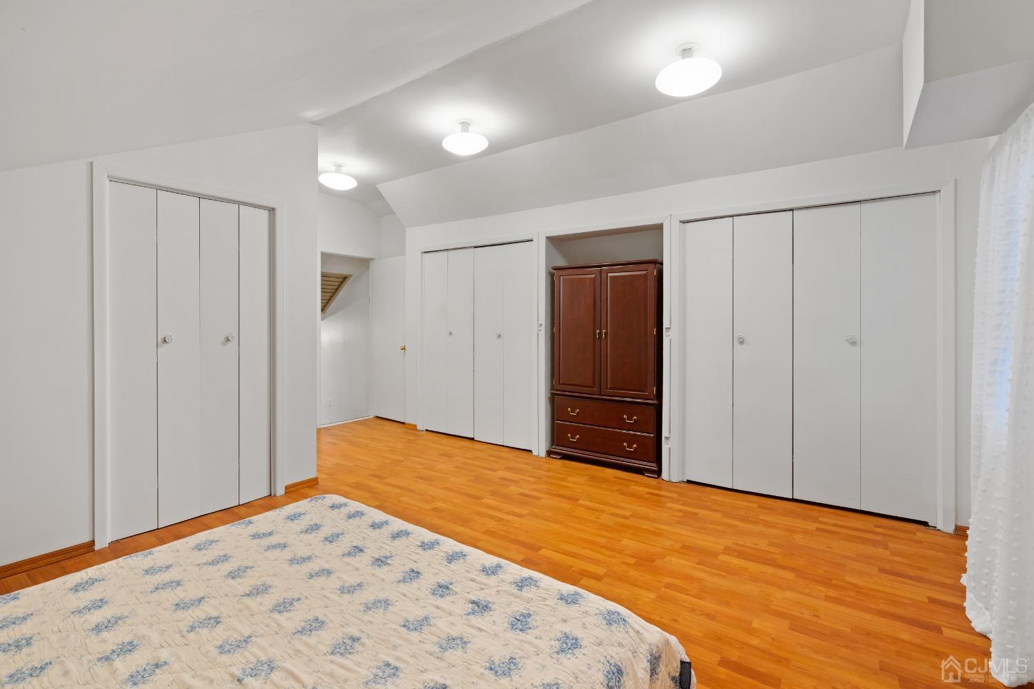 12 Meyer Road Edison, NJ 08817 - Photo 16 of 21 a bedroom with a bed and a closet