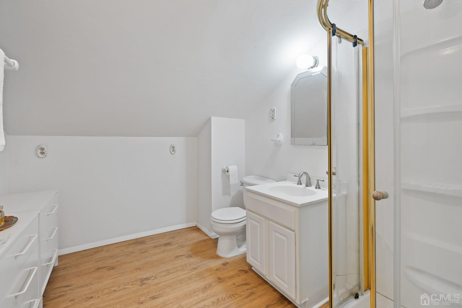 12 Meyer Road Edison, NJ 08817 - Photo 17 of 21 a bathroom with a toilet sink and mirror