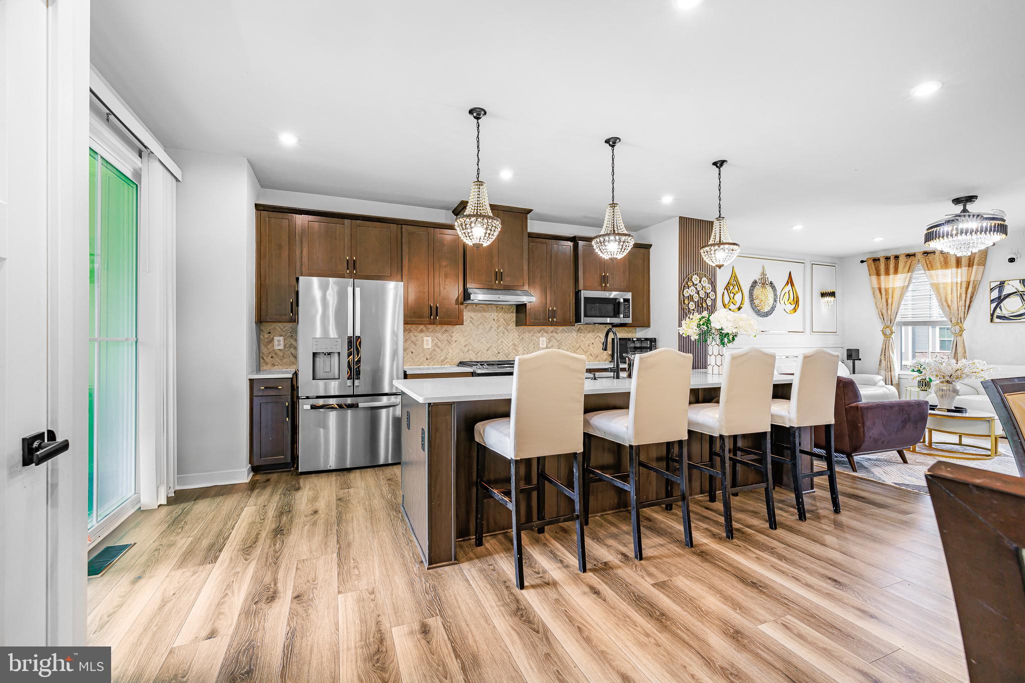 109 Torrey Drive Newark, DE 19702 - Photo 14 of 49 a large kitchen with a table and chairs