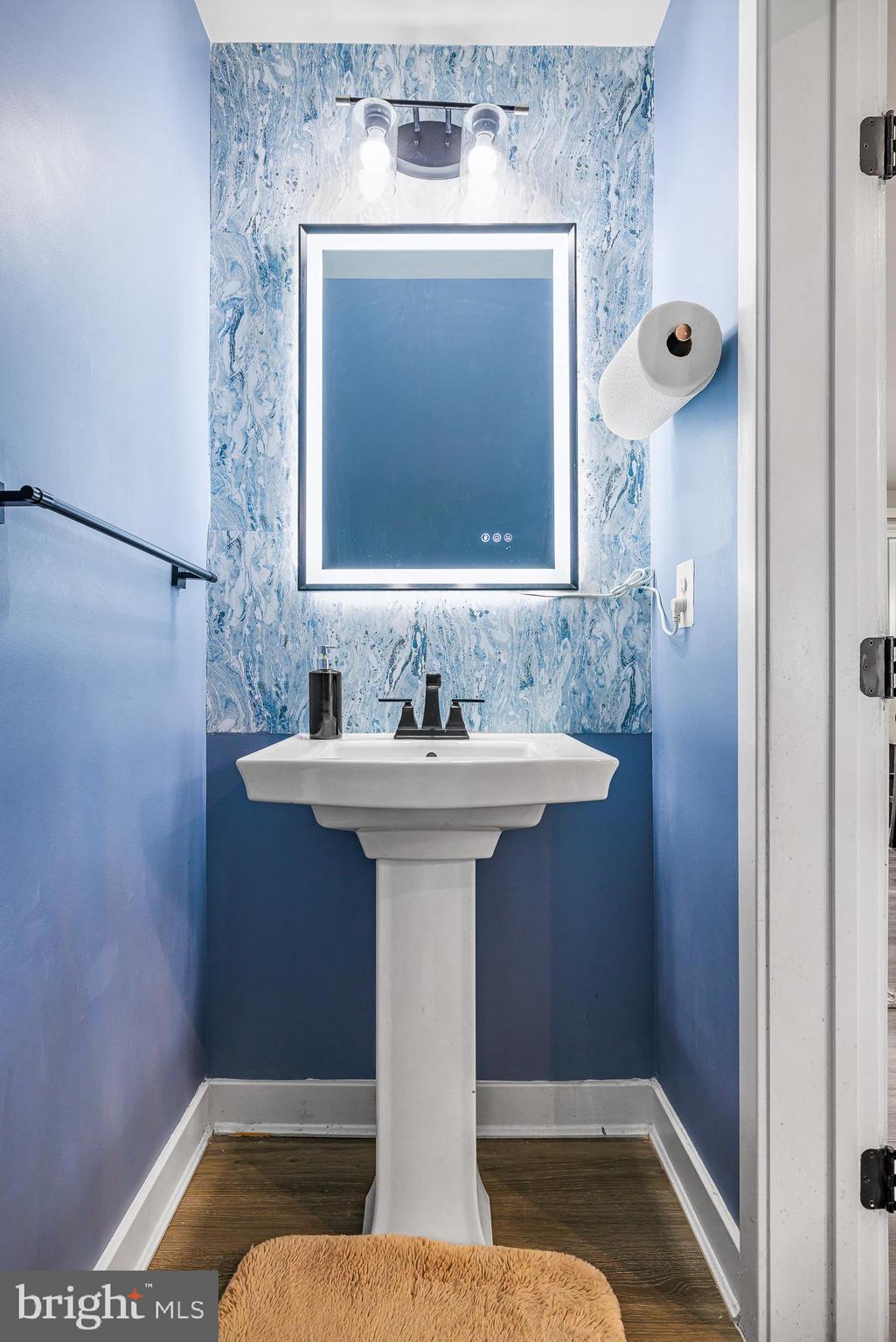 109 Torrey Drive Newark, DE 19702 - Photo 23 of 49 a bathroom with a sink and a mirror