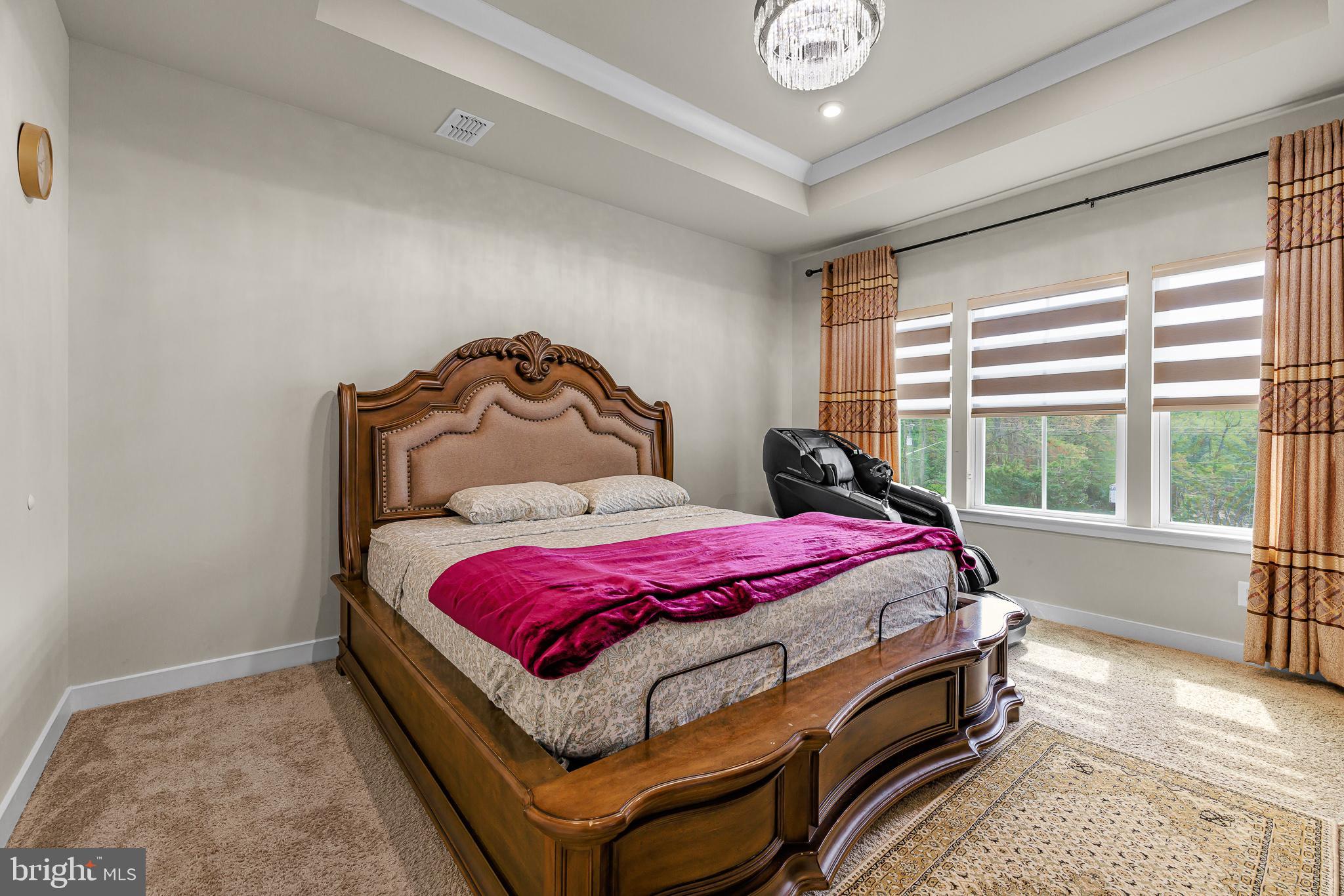 109 Torrey Drive Newark, DE 19702 - Photo 26 of 49 a bed sitting in a bedroom next to a window
