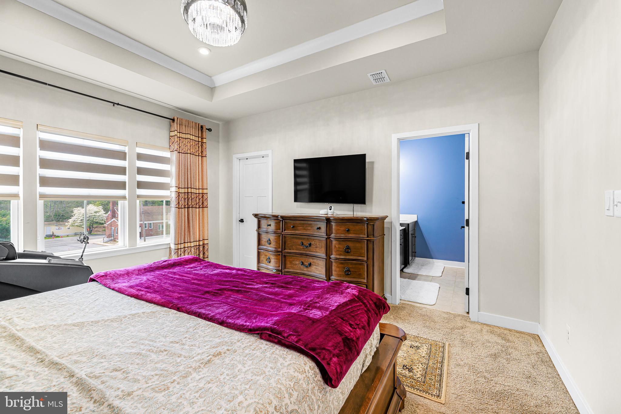 109 Torrey Drive Newark, DE 19702 - Photo 27 of 49 a bedroom with a bed and a flat screen tv