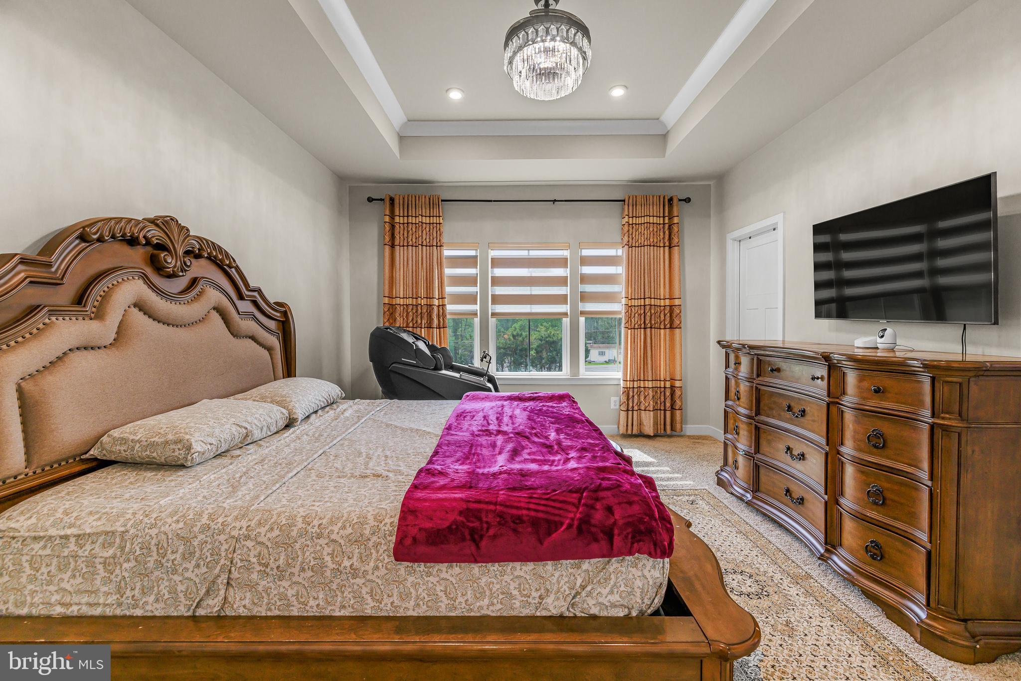 109 Torrey Drive Newark, DE 19702 - Photo 28 of 49 a bedroom with a bed and flat screen tv