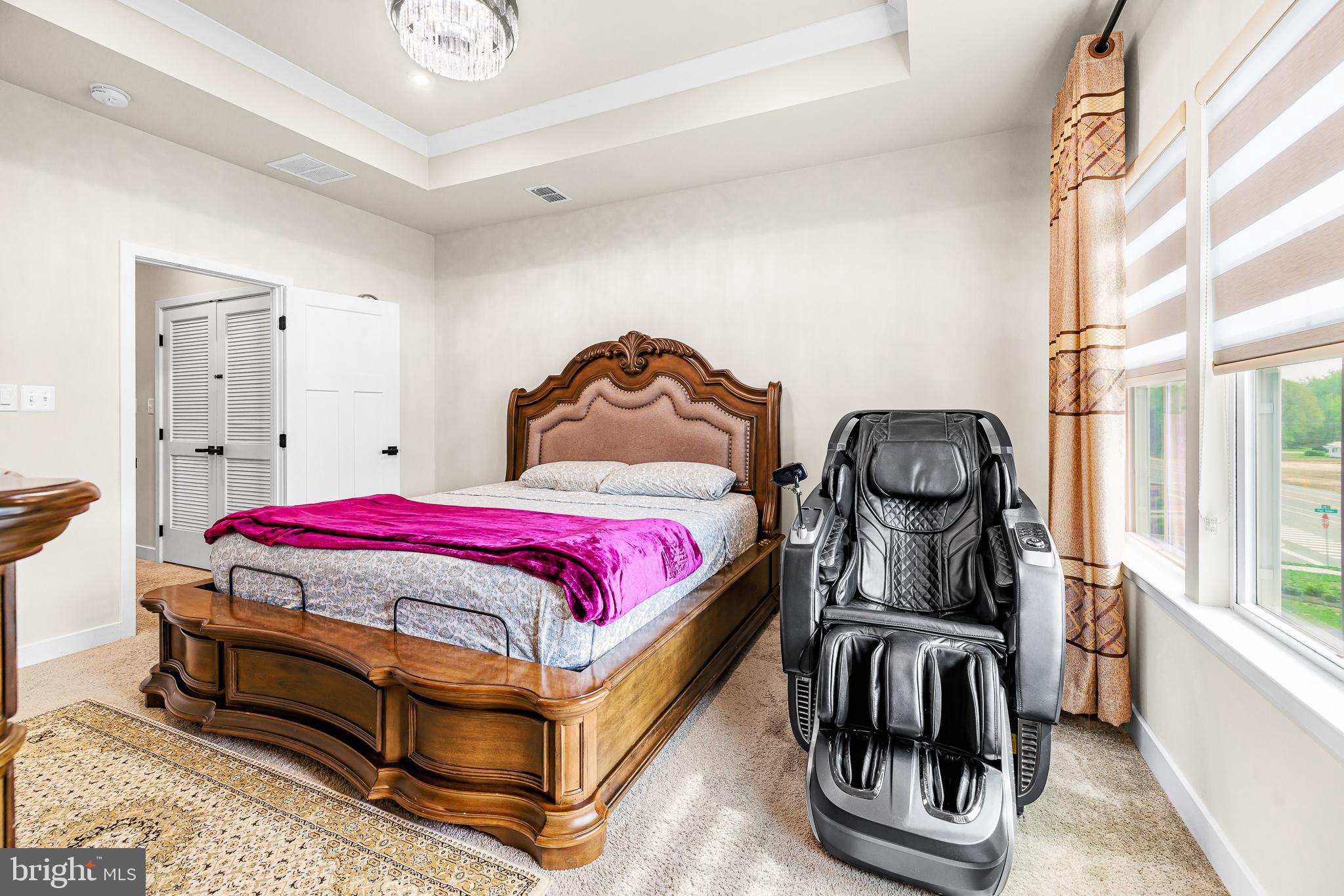 109 Torrey Drive Newark, DE 19702 - Photo 29 of 49 a bedroom with a bed and wooden floor