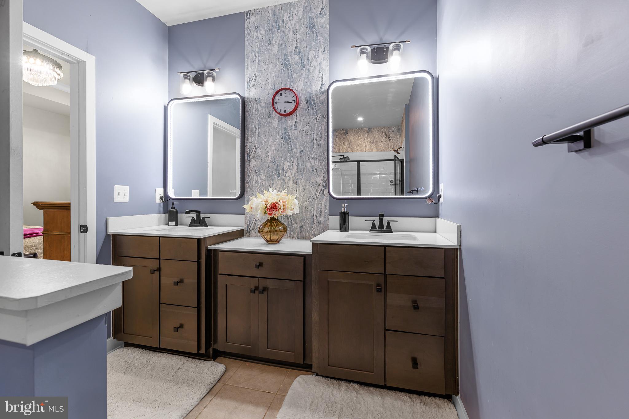 109 Torrey Drive Newark, DE 19702 - Photo 30 of 49 a bathroom with a double vanity sink mirror and
