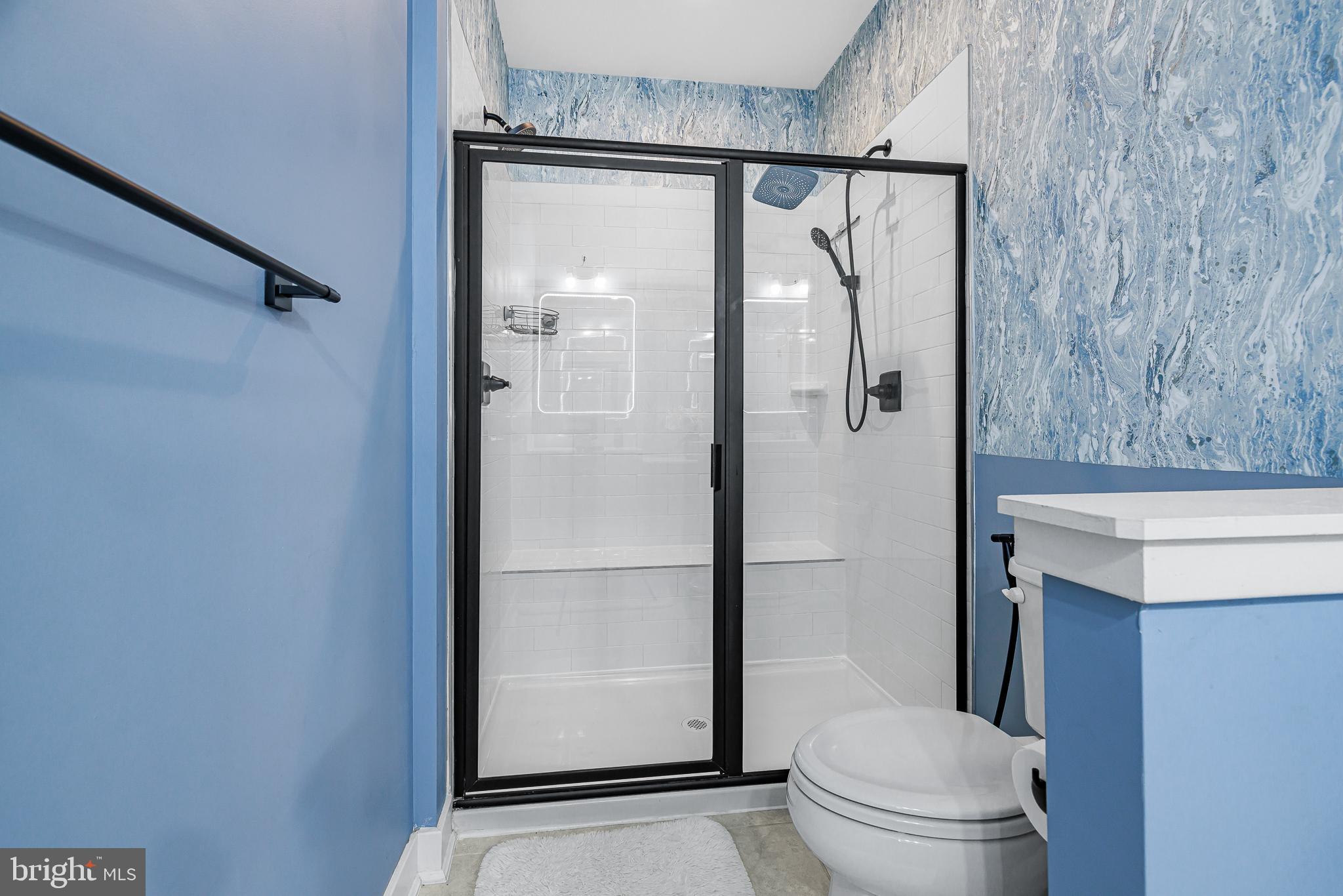 109 Torrey Drive Newark, DE 19702 - Photo 31 of 49 a bathroom with a shower and a toilet