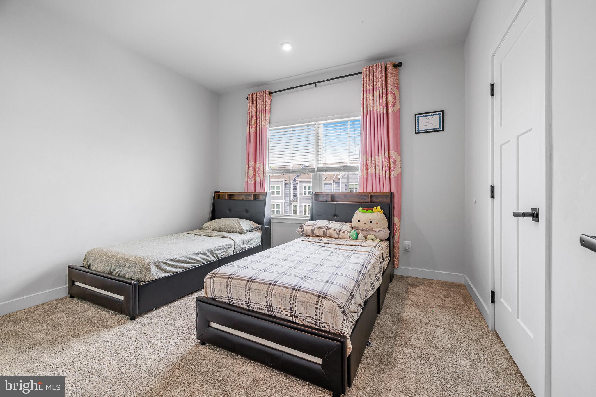 109 Torrey Drive Newark, DE 19702 - Photo 34 of 49 a bedroom with two beds and painted walls