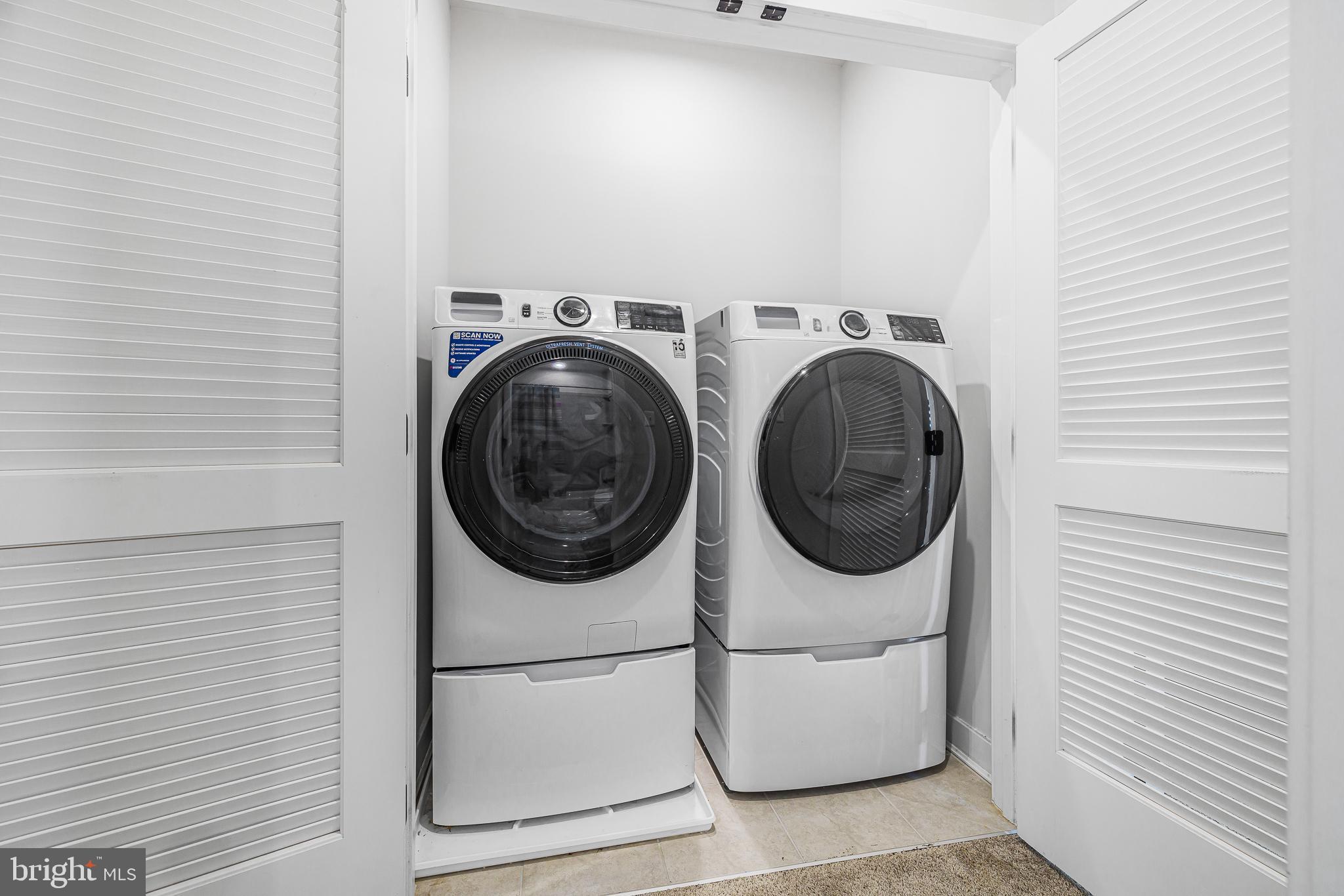 109 Torrey Drive Newark, DE 19702 - Photo 37 of 49 a utility room with dryer and washer