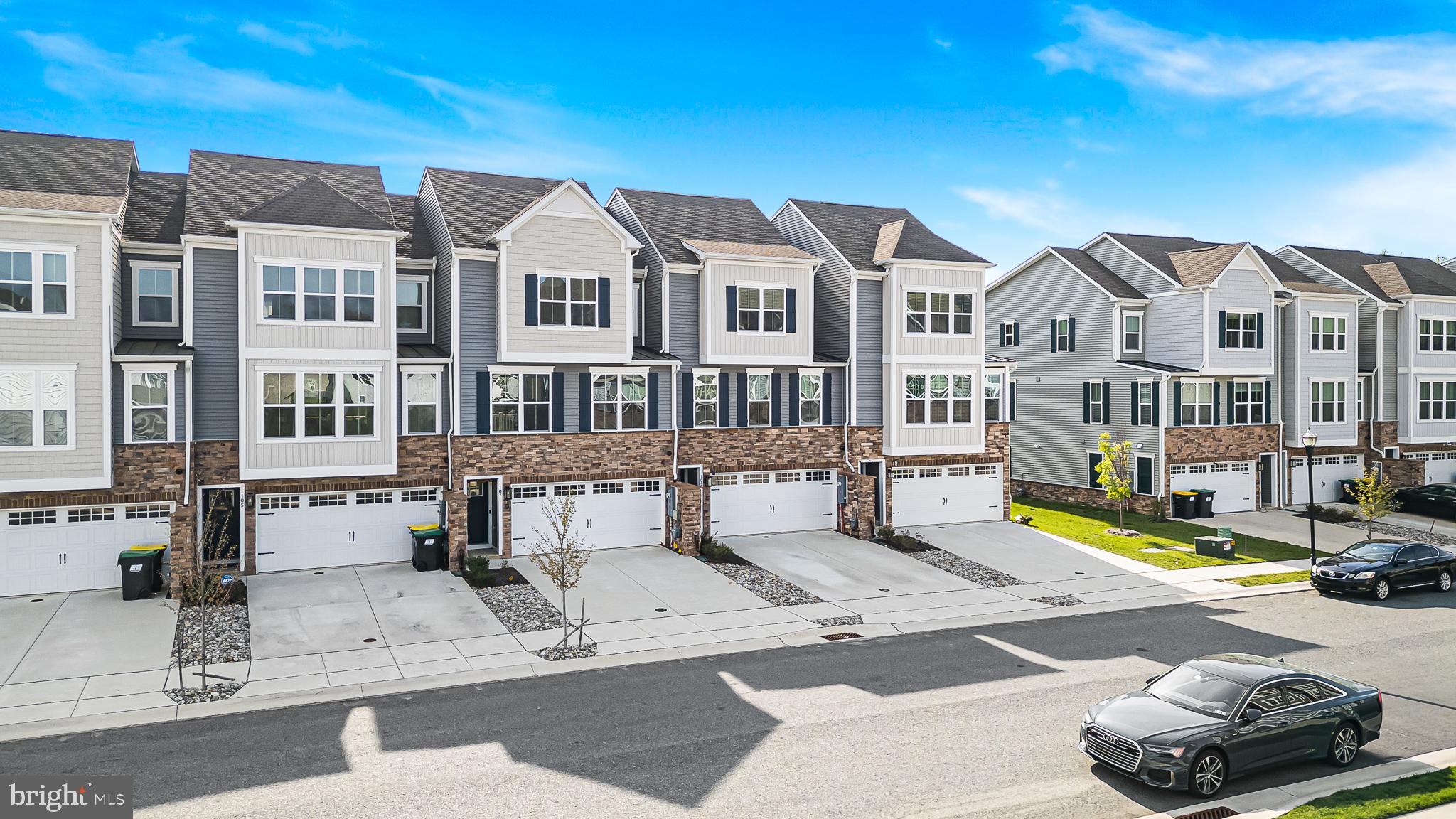109 Torrey Drive Newark, DE 19702 - Photo 38 of 49 a view of a white building with many windows