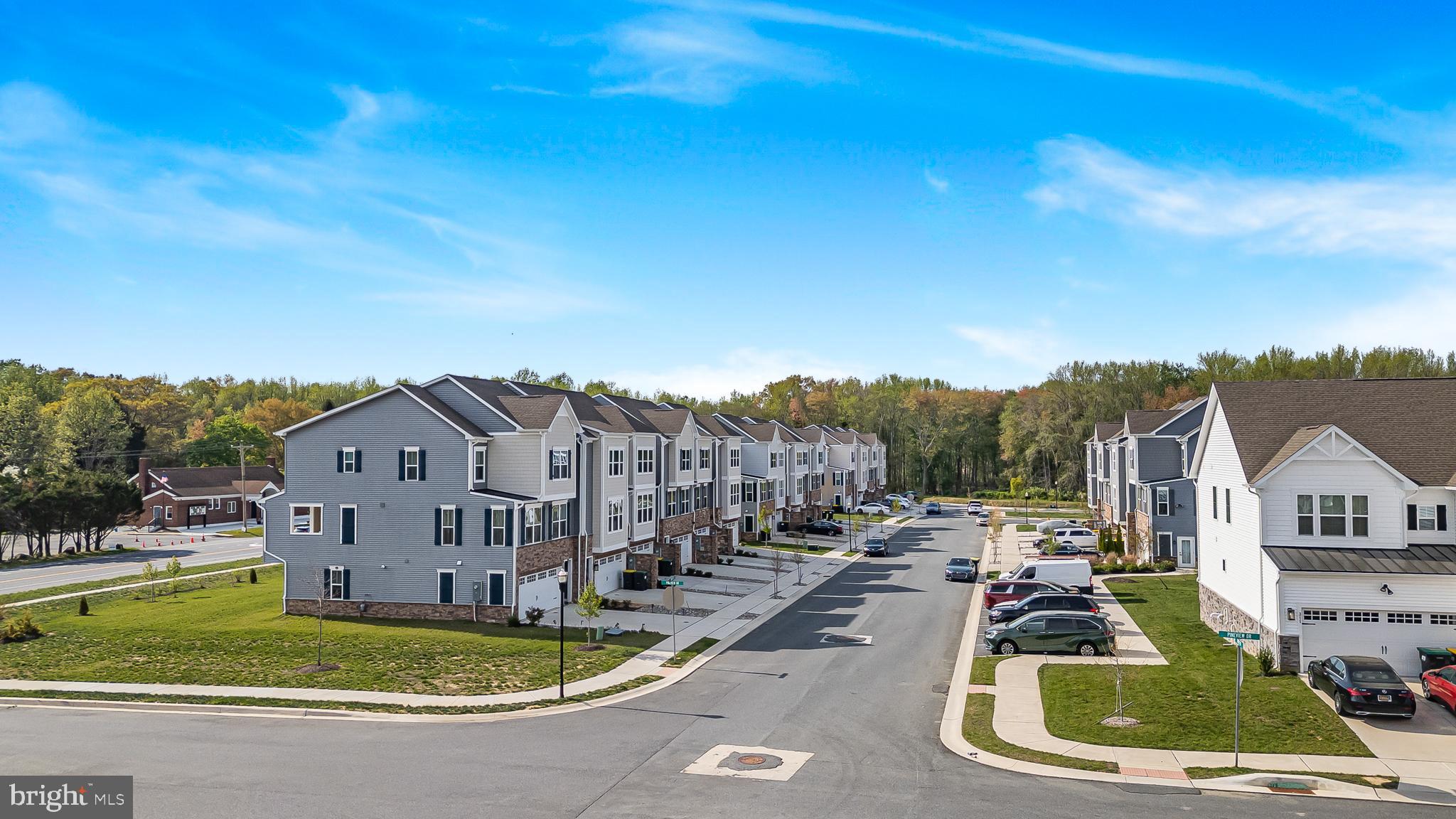 109 Torrey Drive Newark, DE 19702 - Photo 41 of 49 a view of a town with large trees and buildings