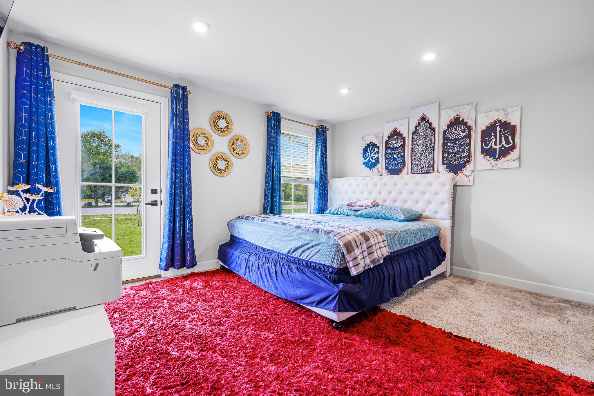 109 Torrey Drive Newark, DE 19702 - Photo 8 of 49 a bedroom with a bed and a couch