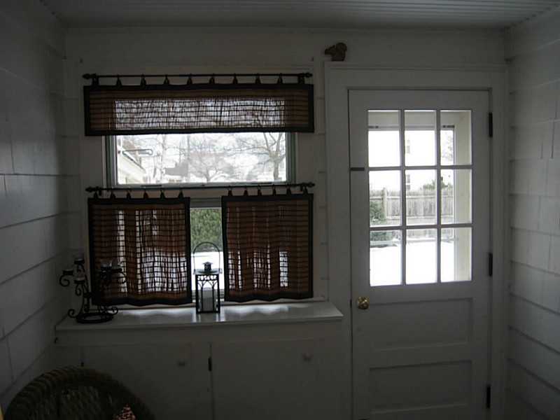58 Briarcliffe Road Cranston, RI 02910 - Photo 24 of 25 Porch. The Breezeway lives up to its name. Enjoy summer evening breezes. Doubles as a mud room in the winter to keep the snow and mud out of the house.