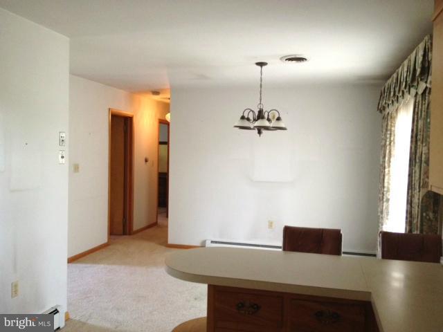14731 Hicksville Road Clear Spring, MD 21722 - Photo 15 of 26 Hallway towards BRs from kitchen