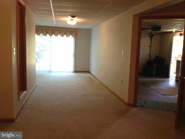14731 Hicksville Road Clear Spring, MD 21722 - Photo 18 of 26 Lower level from fam rm to gar. and entrance