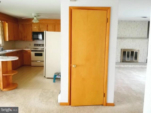 14731 Hicksville Road Clear Spring, MD 21722 - Photo 21 of 26 Kitchen and living rm from dining area