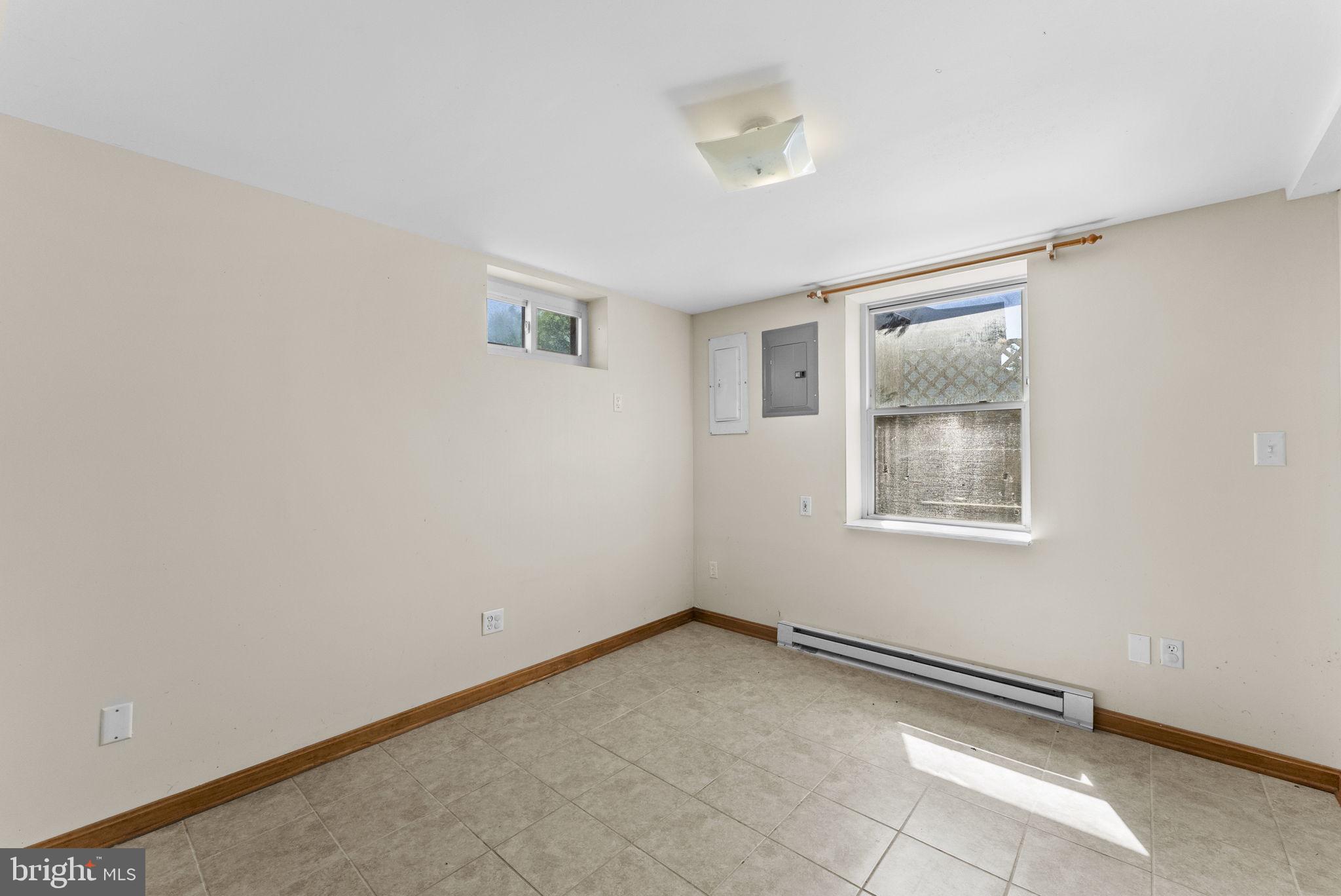 539 Old Meetze Road Warrenton, VA 20186 - Photo 27 of 30 an empty room with windows