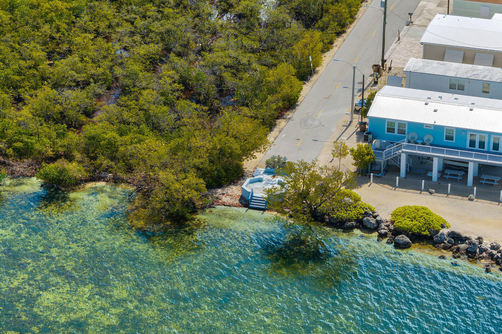 144 Sunset Lane Tavernier, FL 33070 - Photo 20 of 49 a view of a house with a yard