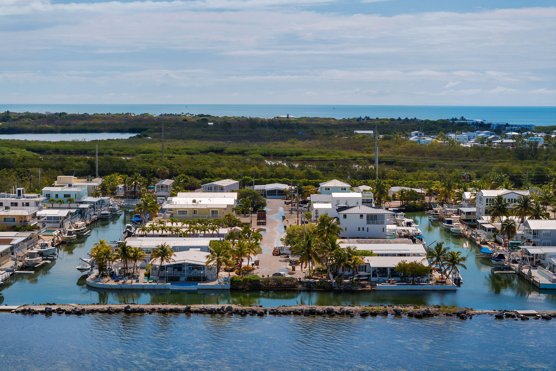 144 Sunset Lane Tavernier, FL 33070 - Photo 2 of 49 an aerial view of residential houses with outdoor space