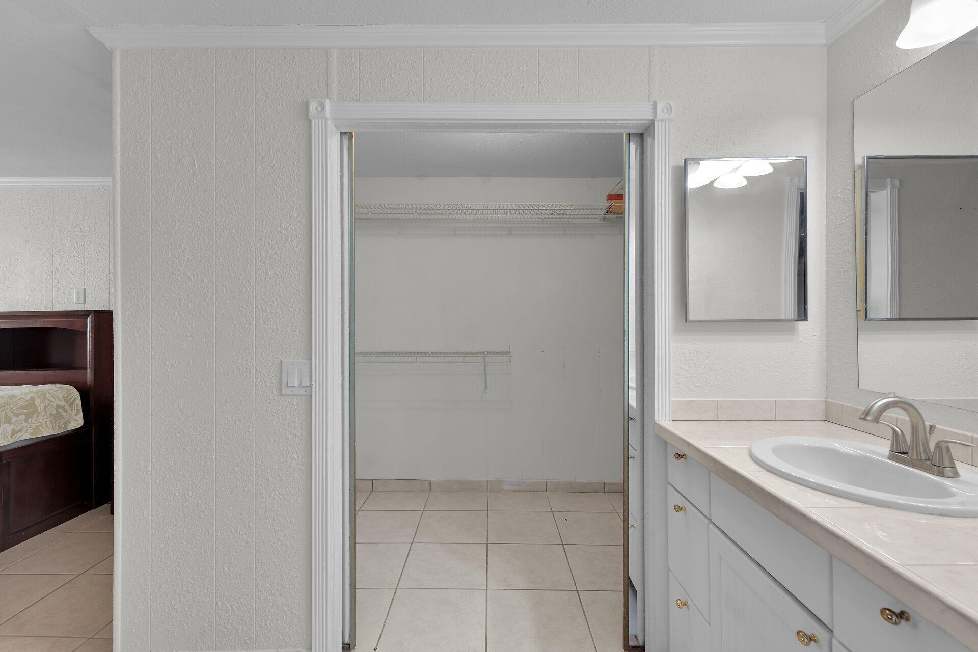 144 Sunset Lane Tavernier, FL 33070 - Photo 33 of 49 a bathroom with a sink and a mirror