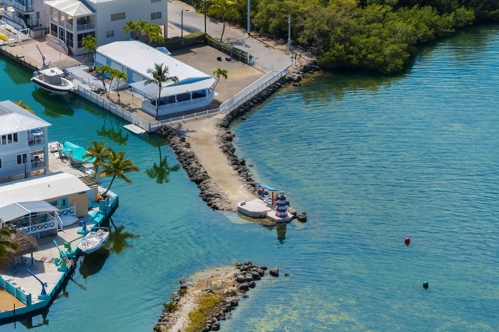 144 Sunset Lane Tavernier, FL 33070 - Photo 34 of 49 an aerial view of a house with a garden