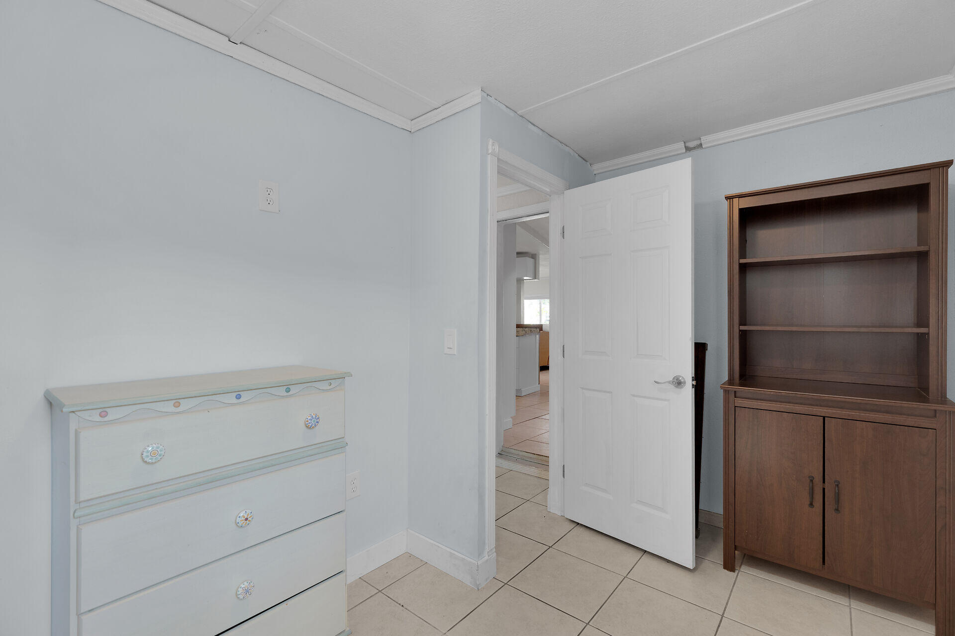 144 Sunset Lane Tavernier, FL 33070 - Photo 8 of 49 a view of walk in closet with cabinet