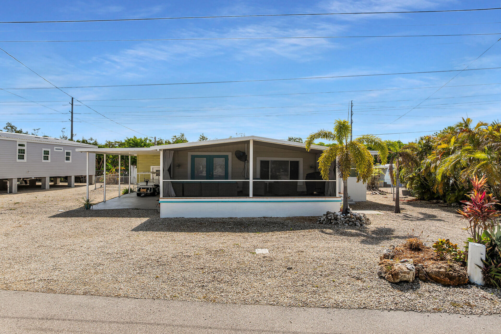 144 Sunset Lane Tavernier, FL 33070 - Photo 10 of 49 a view of a house with a backyard