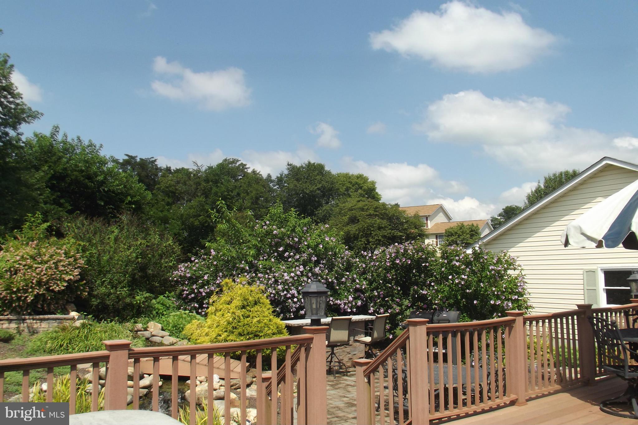 863 Pheasant Hill Road Summit Point, WV 25446 - Photo 22 of 29 a view of a balcony with wooden fence