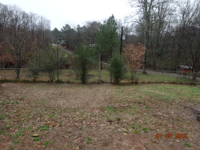 1882 Jordan Road Chapmansboro, TN 37035 - Photo 13 of 13 a view of a backyard with large trees
