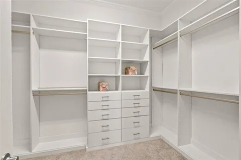 a view of an empty walk in closet