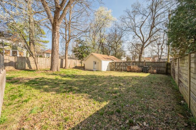 a view of back yard of the house