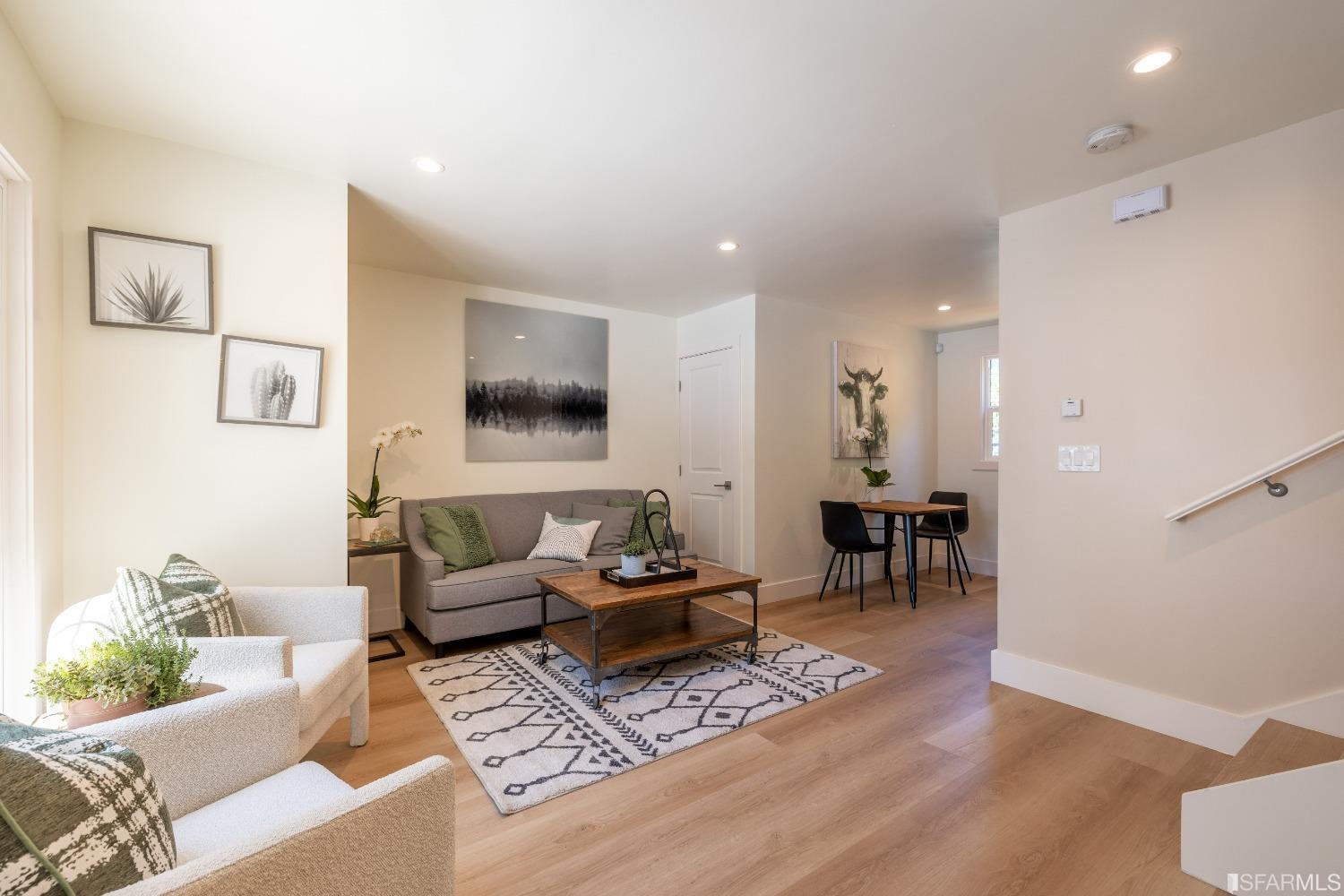 951 University Avenue Berkeley, CA 94710 - Photo 13 of 34 a living room with furniture and wooden floor