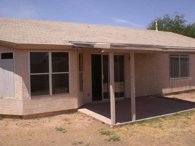 9045 West Monte Vista Road Phoenix, AZ 85037 - Photo 2 of 5 REAR